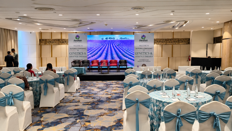 The conference hall set with round tables before a session