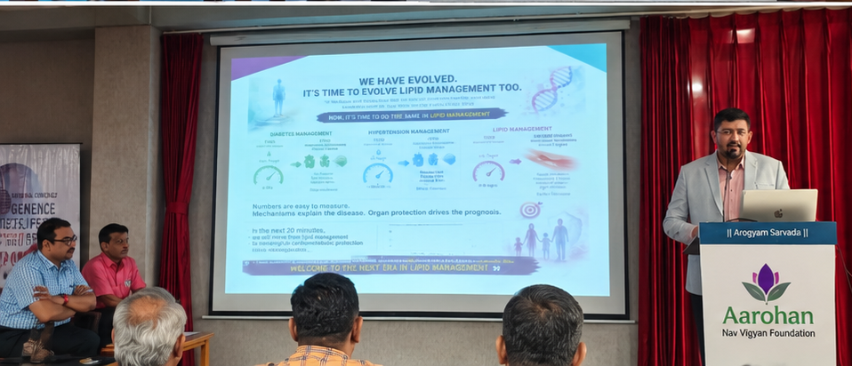 A speaker presenting on lipid management to the MedSpire audience